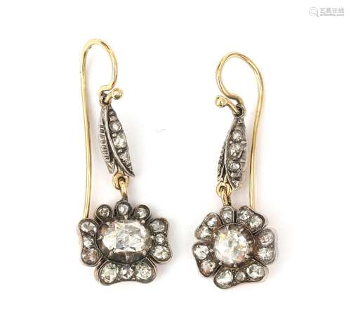 A pair of 14 karat gold and silver rose cut diamond cluster ...