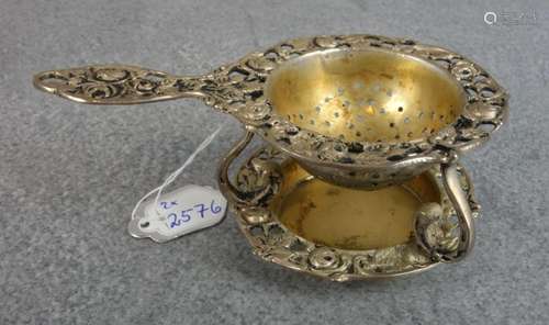 SILVER TEA STRAINER ON STAND