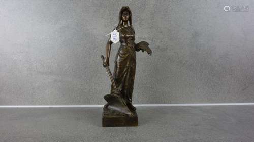 SCULPTURE: "WOMAN WITH PLOWSHARE AND EARS OF CORN"