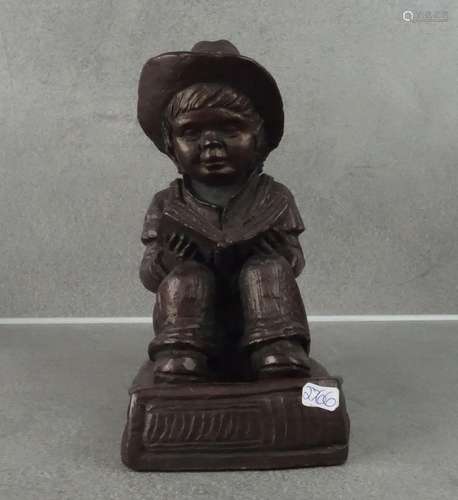 FIGURAL SCULPTURE: READING BOY