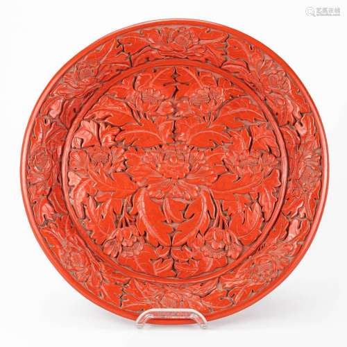 A plate made of lacquered cinnabar and made in China.