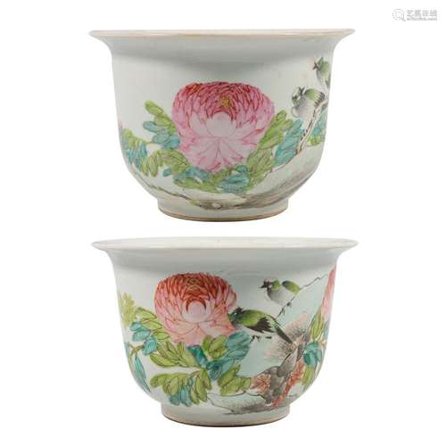 A pair of cache-pots made of Chinese porcelain and decorated...