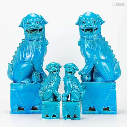 A collection of 2 pairs of Foo dogs made of Chinese porcelai...