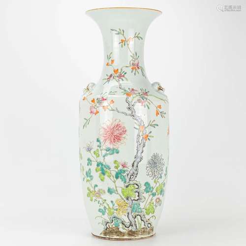 A vase made of Chinese porcelain and decorated with roses an...