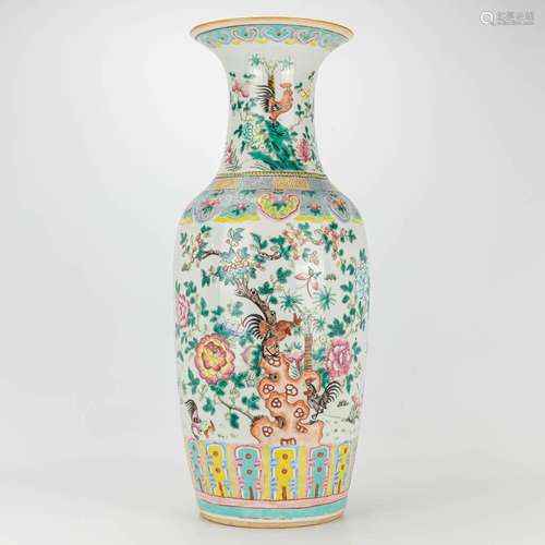 A vase made of Chinese porcleain decorated with flowers and ...