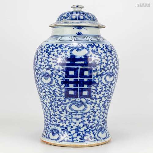 A vase with a cover made of Chinese porcelain and decorated ...