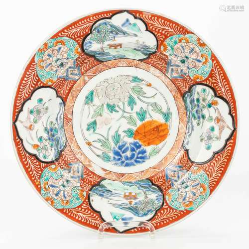 A plate made of Oriental porcelain, marked, 19th century.