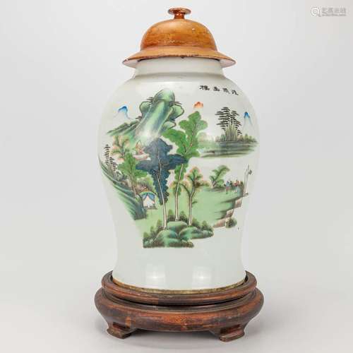 A vase with lid made of Chinese porcelain and decorated with...