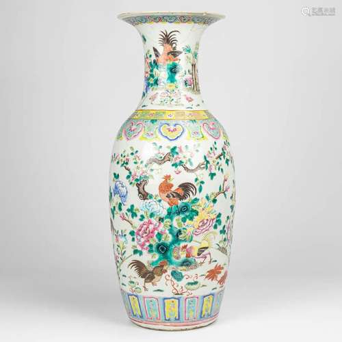 a large vase made of Chinese porcelain and decorated with ro...