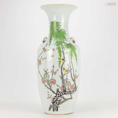 A vase made of Chinese porcelain and decorated with flowers ...