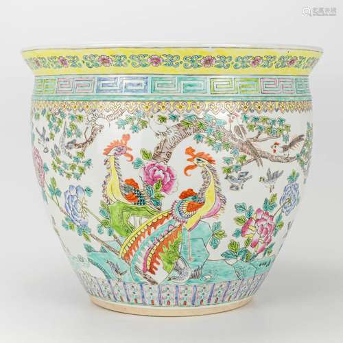 A large cache-pot made of Chinese porcelain and decorated wi...