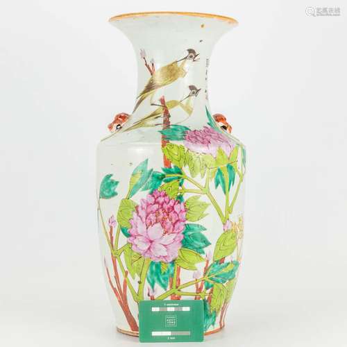 A vase made of Chinese porcelain and decorated with birds an...