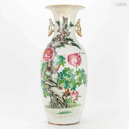 A vase made of Chinese porcelain and decorated with roosters...