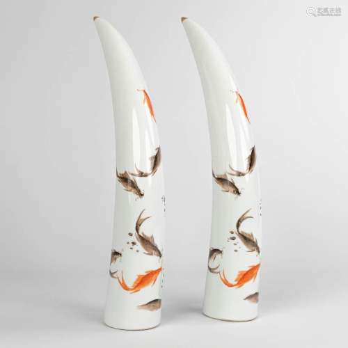 A pair of tusks, made of Chinese porcelain and decorated wit...
