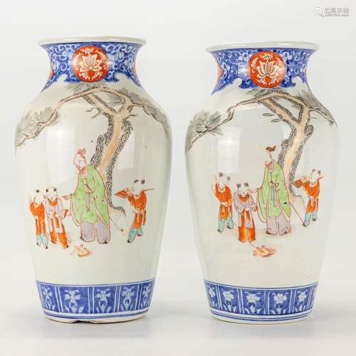 A pair of vases made of Chinese porcelain and decorated with...