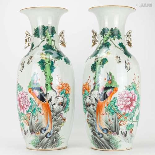 A pair of vases made of Chinese porcelain and decorated with...