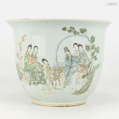 A cache-pot made of Chinese porcelain and decorated with lad...