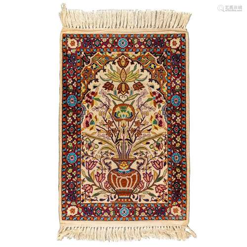 An oriental hand-made carpet made of Kashmir and wool. (90 x...