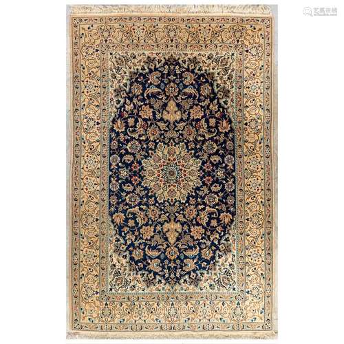 An Oriental hand-made carpet. Keshan. (119 x 185 cm)