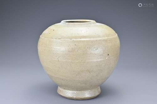 A Southeast Asian stoneware ceramic jar. The globular