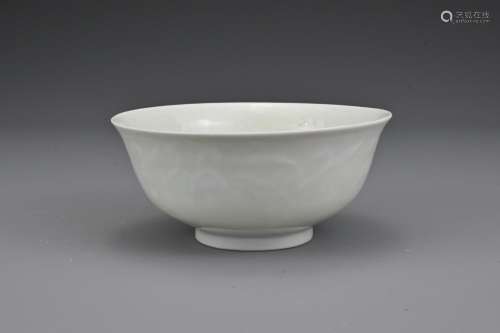 A Chinese white-glazed porcelain bowl with moulded
