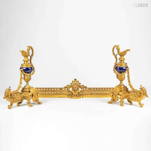 An antique ormolu fireplace fender made of bronze in Louis X...