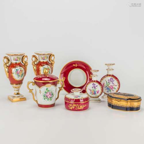 A collection of items made of glazed porcelain and marked Li...