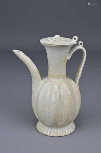 A Chinese Qingbai glaze pottery ewer and cover, Song