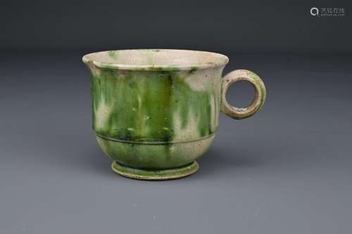 A Chinese Tang Dynasty (618-907AD) green glazed cup