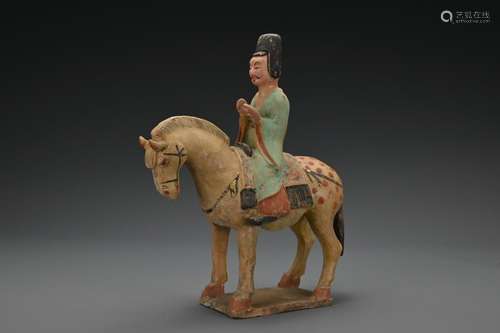 A Chinese Sui dynasty straw-glazed and painted horse