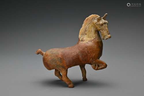 A rare Chinese Han dynasty amber-glazed pottery figure