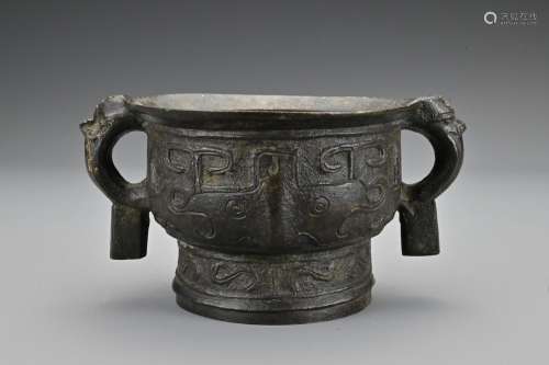 A Chinese 18/19th century bronze censer. The archaic