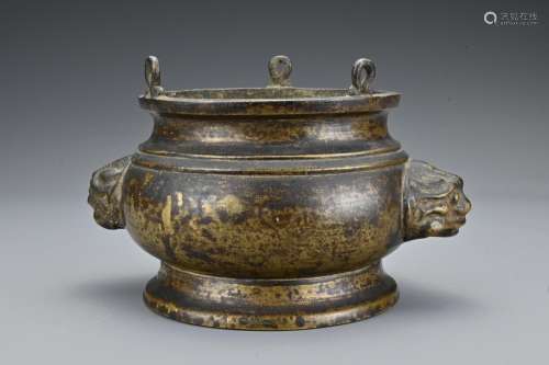 A Chinese 19th century bronze censer. The censer with