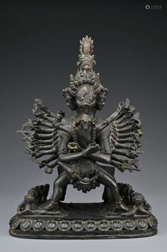 A large Sino-Tibetan 19/20th Century bronze figure of