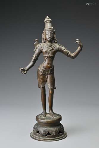 A bronze standing figure of a Goddess on lotus stand,