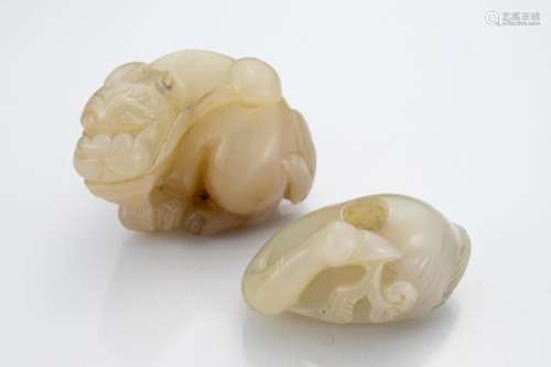 Chinese pale celadon jade carvings of a recumbent lion