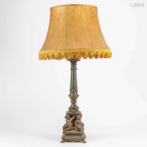 A table lamp made of bronze with putti. The second half of t...