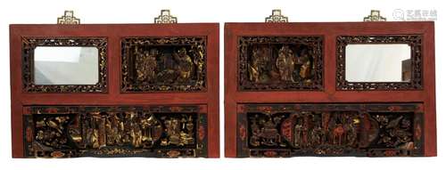 A pair of Chinese red lacquer panels with ornate gilt