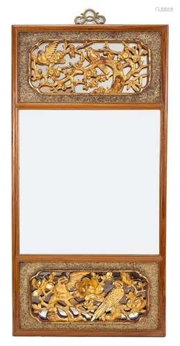 A Chinese mirror with carved gilt-lacquer wood panels