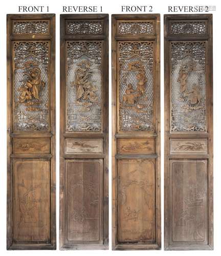 A very tall pair of Chinese carved wood panels. Each