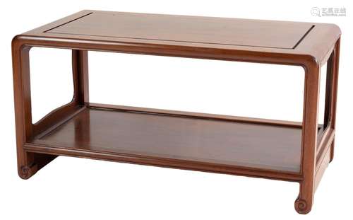 A Chinese two-tier hardwood coffee table with scrolled