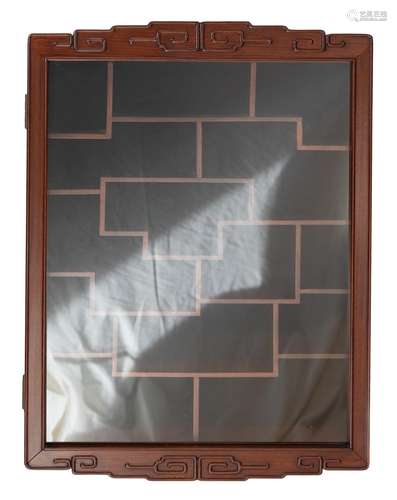 A Chinese carved hardwood wall-mount display case with