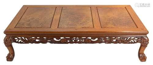 A Chinese hardwood low coffee table with three burr