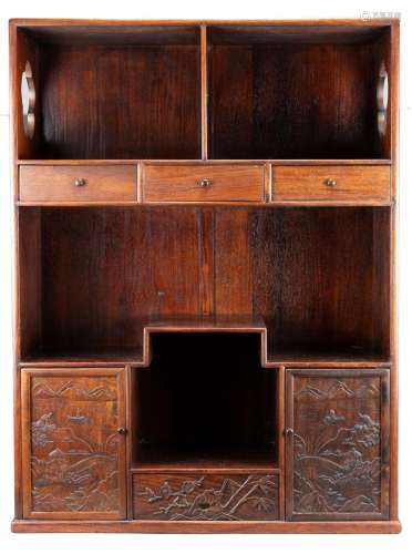 A Chinese hardwood tea cabinet. Of rectangular form