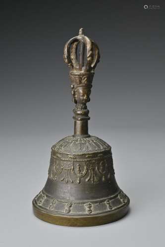 A Tibetan bronze ceremonial bell with half-vajra finial