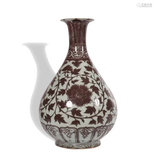 A copper-red-glazed 'floral' pear-shaped vase