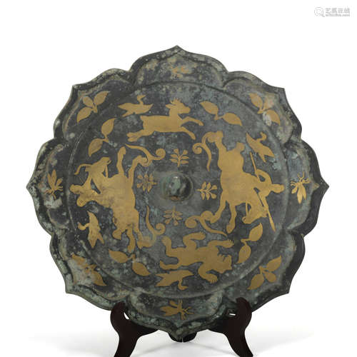 A gilt-bronze mirror