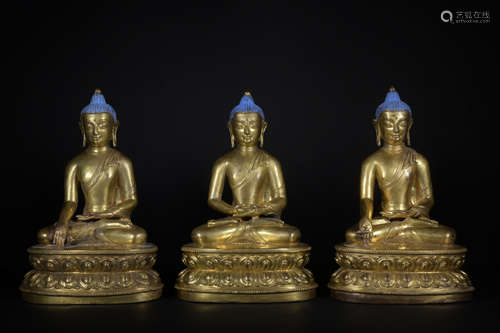 A set of gilt-bronze statue of Trikalea Buddhas