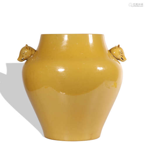 A yellow glazed jar
