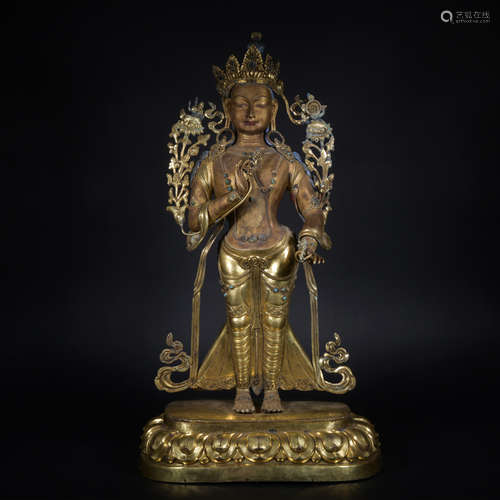 A gilt-bronze statue of Padmapani